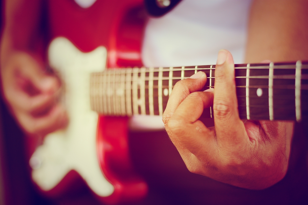 guitarist playing chords