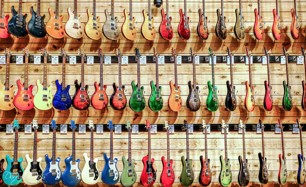 rows of colorful guitars